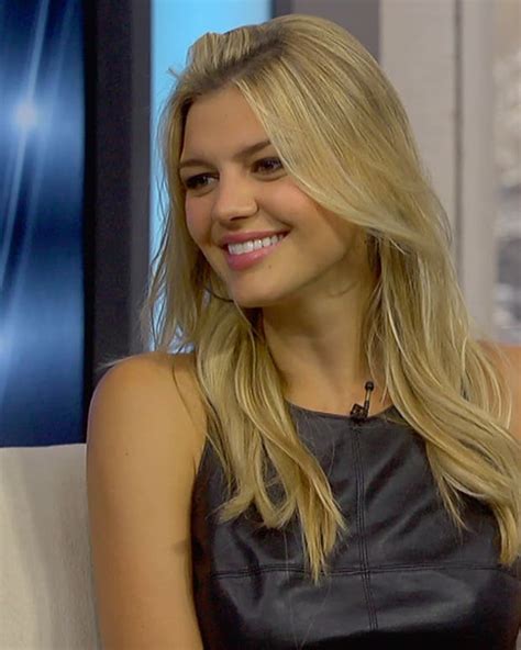 Kelly Rohrbach’s Most Viral SI Swimsuit Photos